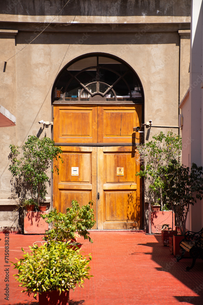 Fototapeta premium historic door of an old building monitored by cameras