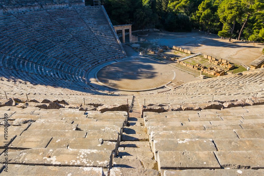 Ancient Theatre of Epidaurus is theatre in Greek city of Epidaurus, located on southeast end of sanctuary dedicated to the ancient Greek God of medicine, Asclepius in Peloponnese, Greece