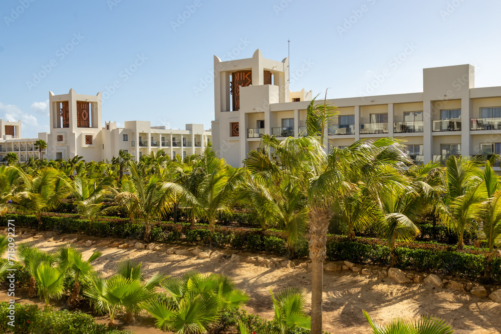 Exotic holiday resort in Cape Verde with palm trees and blue sky