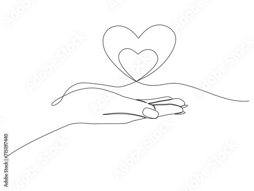 One continuous line drawing of hand holding two heart. Vector illustration