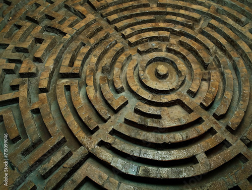 Rustic metal labyrinth design. Historical maze pattern for cultural and archeological interests. Symbol of complexity and ancient art. 