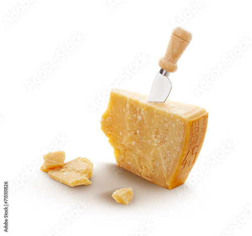 Aged parmesan cheese or parmigiano reggiano and a knife isolated on a transparent background