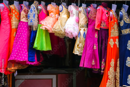 Puttaparthi, India. Dress for sale at the street shop. photo