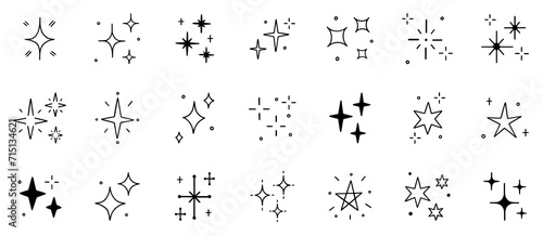 Stars and sparkles doodle set. Twinkle, blink, firework, glitter silhouette and glowing symbols in sketch style. Hand drawn vector illustration isolated on white background photo