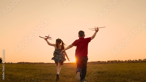 happy boy girl child play airplane pilot sunset, children family dream flying, happy family cherish simple pleasures life, school bell rings, run, building bonds having fun, building team, teaching