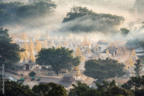 Mist filled valley with Nget Pyaw Taw Pagoda at sunrise, Shan state, Myanmar photo