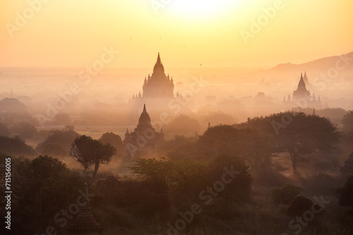 Sunrise over valley with many pagodas, Bagan, Myanmar photo