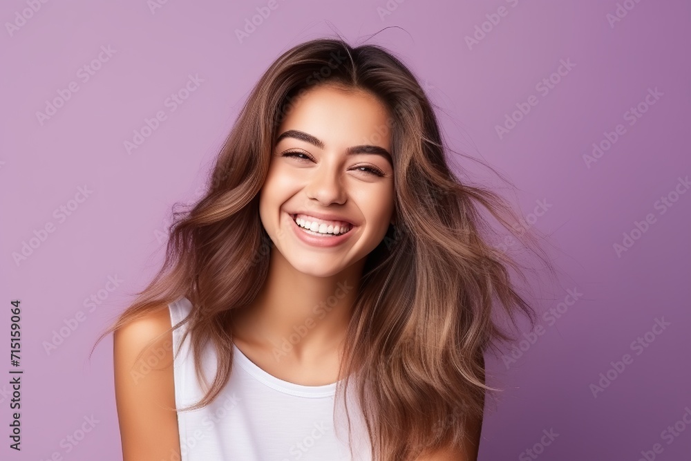 Portrait of beautiful young happy smiling woman with long healthy hair. Portrait of beautiful young happy smiling woman with long healthy hair.