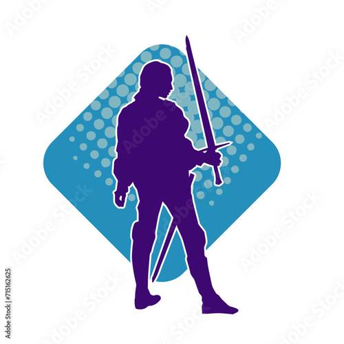 Silhouette of a female fighter in action pose carrying sword weapon.