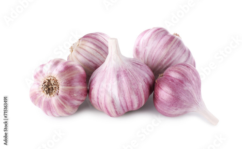 Pile of fresh raw garlic heads isolated on white