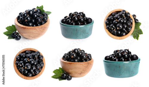 Ripe black currants in bowls and green leaves isolated on white, set