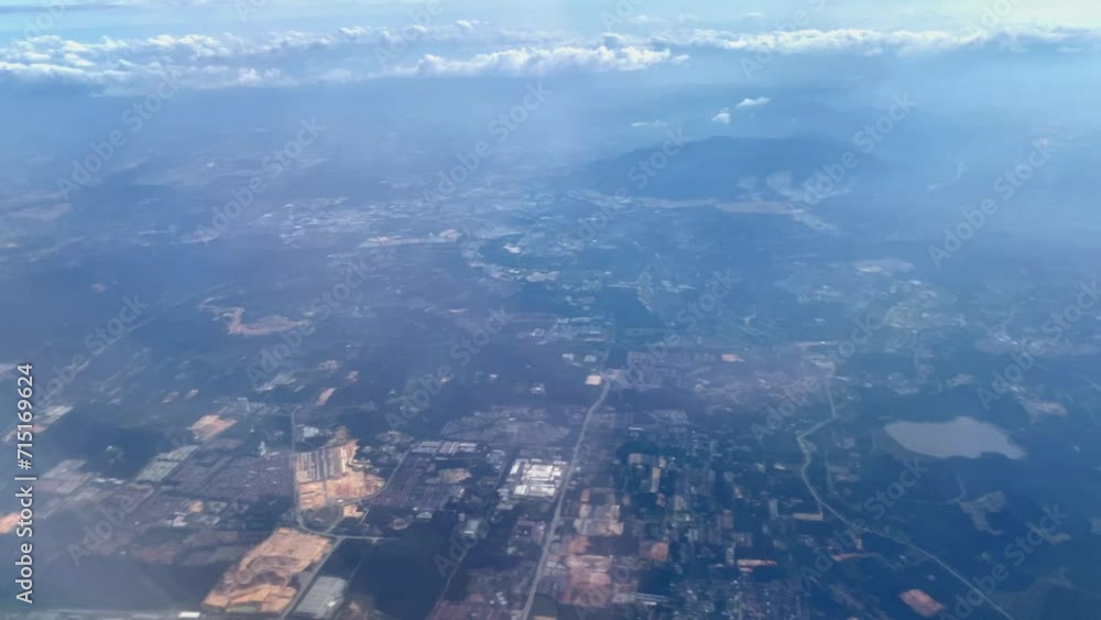 Beautiful aerial view seen through window of flying airplane Beautiful aerial view seen through window of flying airplane