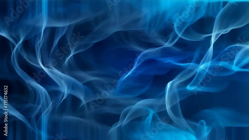 Delicate smoke wafting against a deep blue background, forming random shapes that express visual fluidity and lightness.
 photo