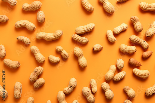 Generative AI Image of Top View of Shell Peanuts on Orange Background photo