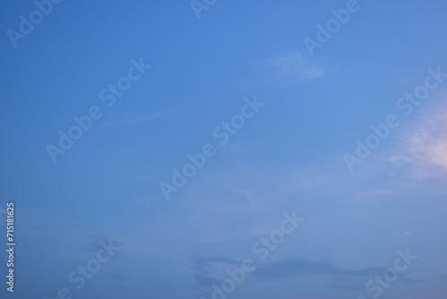 beautiful blue sky and white fluffy cloud with in the evening, natural background