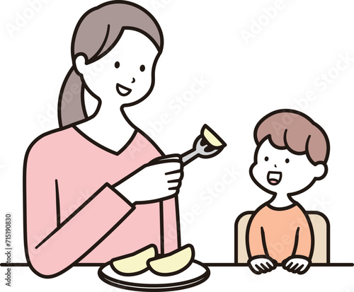 母親が子供にリンゴを食べさせているイラスト素材