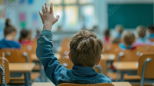 A young student raises their hand high in a vibrant classroom. 
