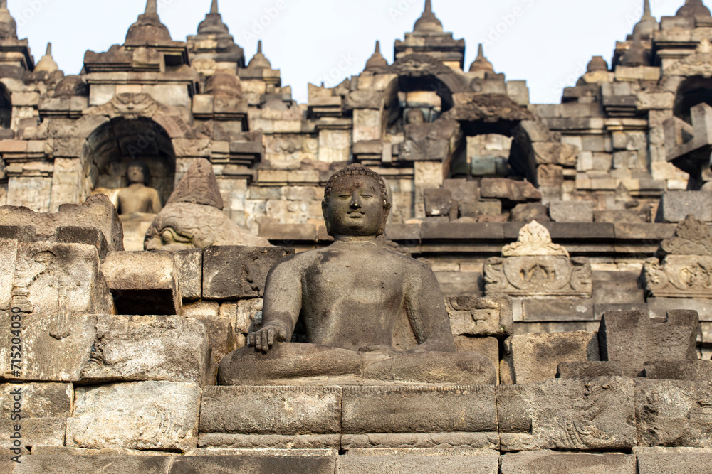 Buddha Statue At Borobudur Temple In Central Java, Indonesia. The Borobudur Temple Compounds Is One Of The Greatest Buddhist Monuments In The World.