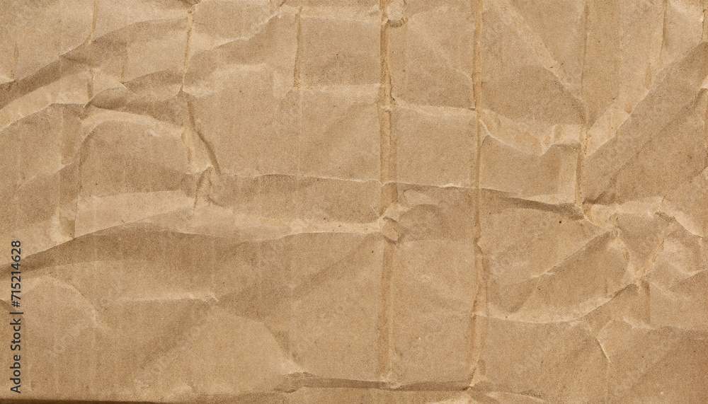Fototapeta premium Rumpled brown cardboard paper texture. high-quality photo