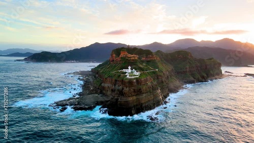 Bitoujiao Lighthouse at the Northeast coast of Taiwan (New Taipei City and Yilan) National Scenic Area. photo