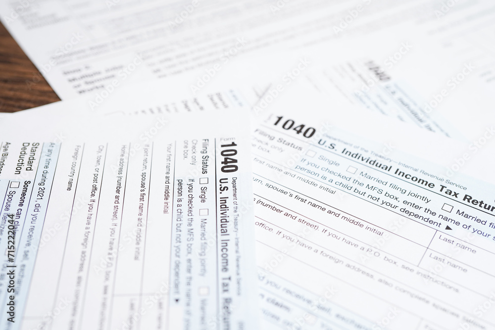 Tax form 1040 U.S. Individual Income Tax Return, business finance concept. Tax form 1040 U.S. Individual Income Tax Return, business finance concept.