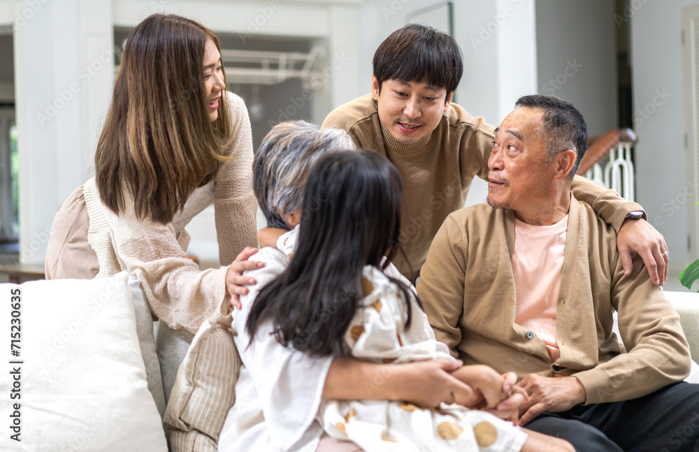 Portrait of happy love family asian father and mother playing with adorable asian kid girl.daughter, care, insurance.Happy family moments good time love with grandparents.Love of big family. Portrait of happy love family asian father and mother playing with adorable asian kid girl.daughter, care, insurance.Happy family moments good time love with grandparents.Love of big family.