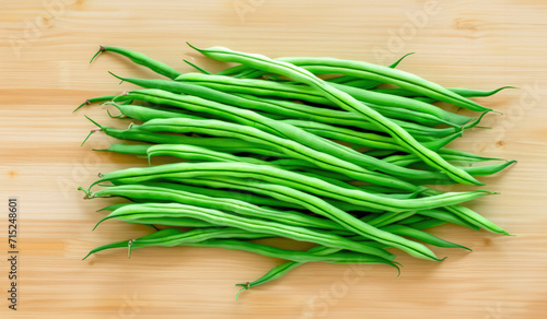 green beans on wooden background