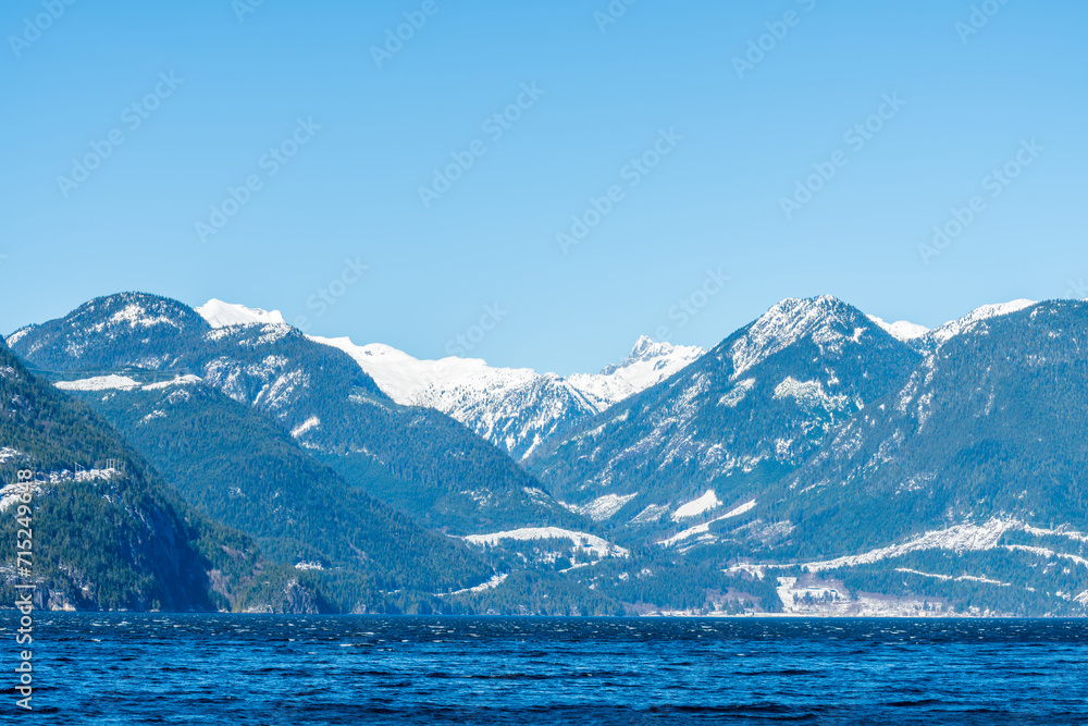 ocean view with mountains, blue sky