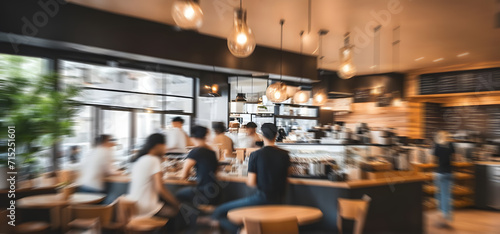Bright Blur coffee shop with people in walking in blurred motion in coffee shop space