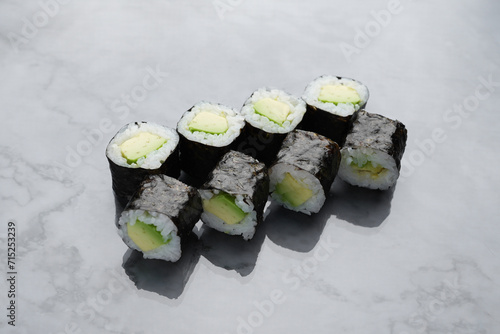 Avocado maki sushi roll with fresh avocado and rice