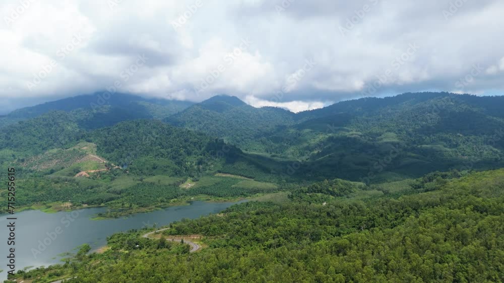 Krabi Khao Phanom Bencha Mountain and National Park with Water Reservoir, Mountains in Southern Thailand covered in Clouds Krabi Khao Phanom Bencha Mountain and National Park with Water Reservoir, Mountains in Southern Thailand covered in Clouds
