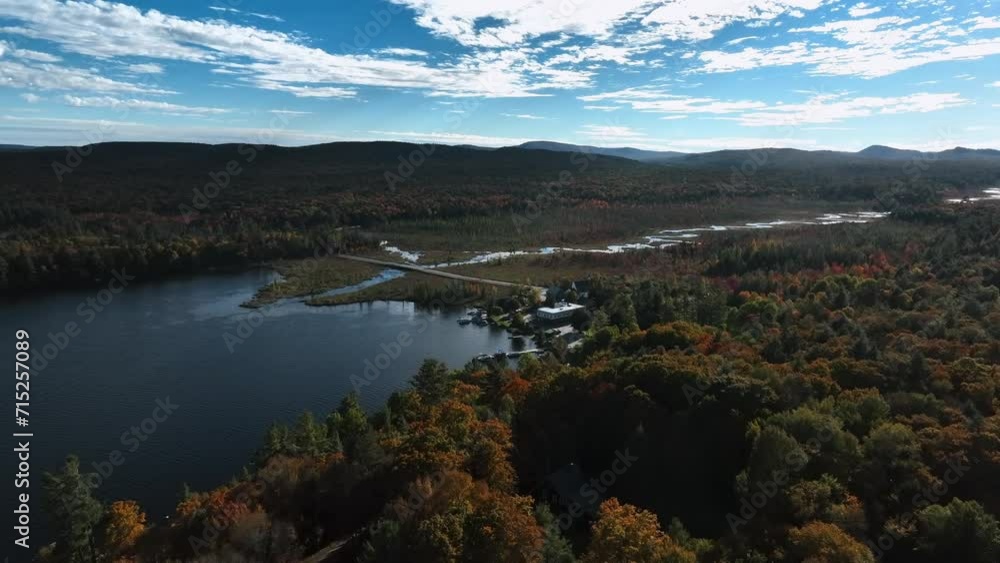 Aerial View Of Road Bridge And Wetlands Near Raquette Lake In Hamilton County, New York, United States. Fall colors. Aerial View Of Road Bridge And Wetlands Near Raquette Lake In Hamilton County, New York, United States. Fall colors.