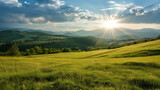 Sunrise over lush green hills and meadows.