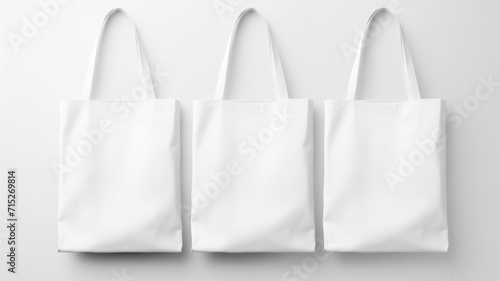 Three Cotton eco bags set, fabric white bag with handle for shopping. photo