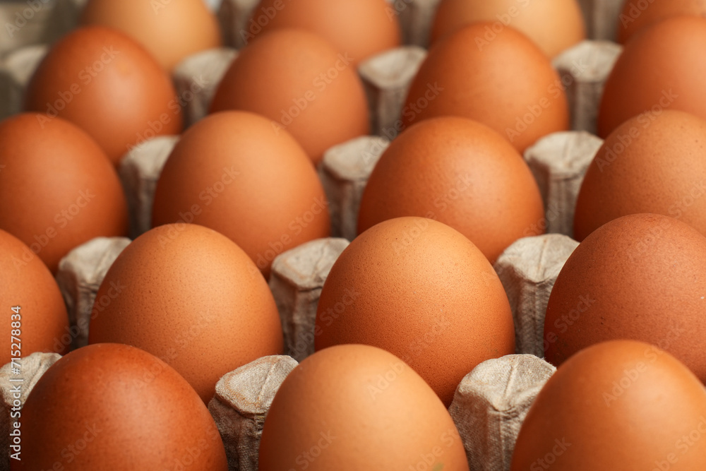 Fresh eggs for sale at a market. Brown eggs Fresh eggs for sale at a market. Brown eggs
