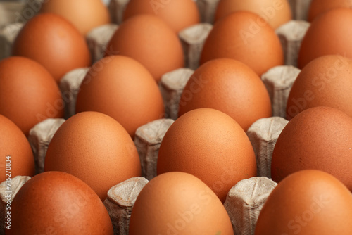 Fresh eggs for sale at a market. Brown eggs
