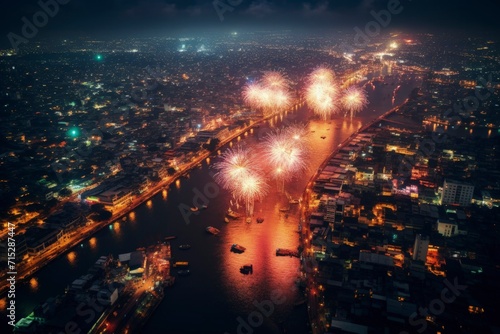 Spectacular fireworks light up the night sky above a bustling city river.