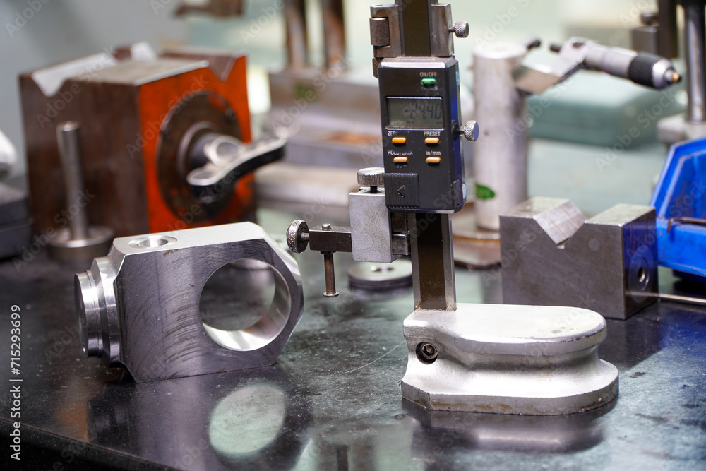 row of height gauges in an engineering lab,Caliper height gauge on