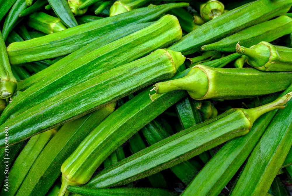 Fresh okra on the market in India. Close-up. Fresh okra on the market in India. Close-up.