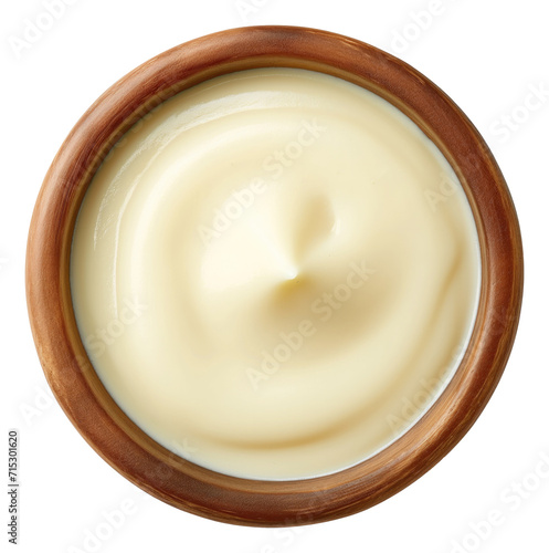 Bowl of condensed milk cream isolated.