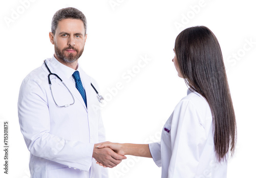 promotion deal in medicine. doctor handshake with nurse. healthcare insurance deal. medicine and healthcare. medical deal between two colleague isolated on white. Deal in progress