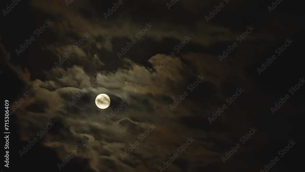Clouds passing by moon at night. Full moon at night with cloud real time. Clouds passing by moon at night. Full moon at night with cloud real time.