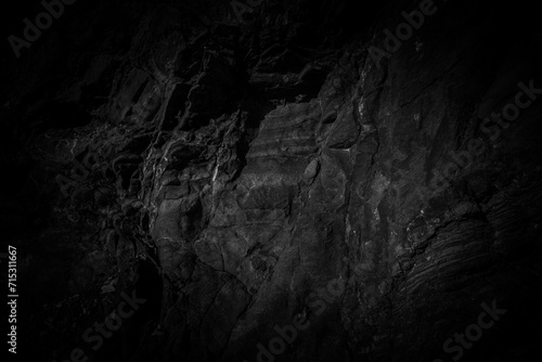 Black and white rock surface texture. Weathered stone background. photo