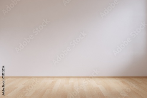 Empty minimalist interior space background with natural light on white wall and wooden floor.