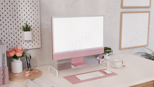 Beautiful, minimal female office desk with a pink PC computer and accessories on a white table. © bongkarn
