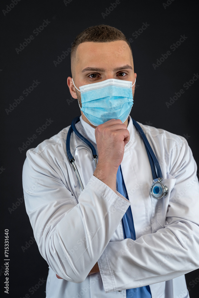 Portrait of caucasian professional doctor in protective cloth mask and gloves stethoscope isolated Portrait of caucasian professional doctor in protective cloth mask and gloves stethoscope isolated