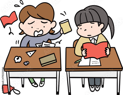 教室の机を並べた隣の子が探し物をしている