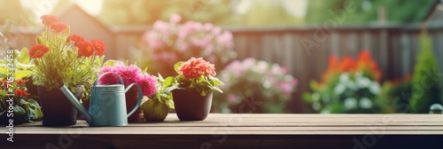 Flower pots on a wooden table photo