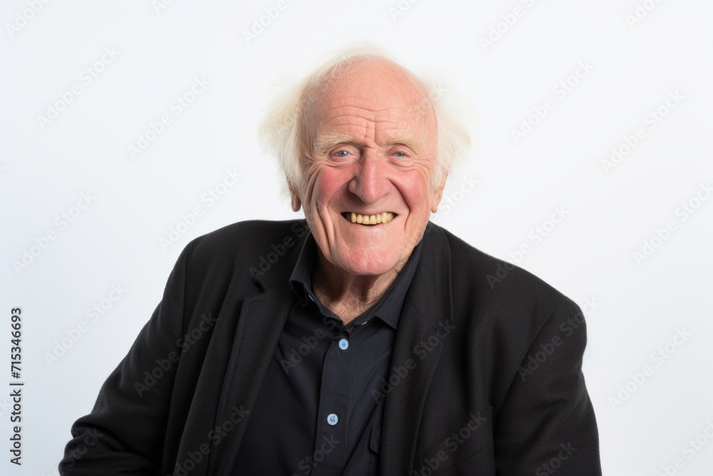 Old man making funny faces on a white background. Studio shot. Old man making funny faces on a white background. Studio shot.