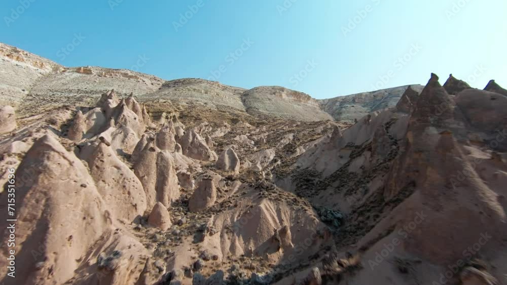 Cappadocia Fairy Chimneys Rock Formation In Turkey. - aerial FPV Cappadocia Fairy Chimneys Rock Formation In Turkey. - aerial FPV